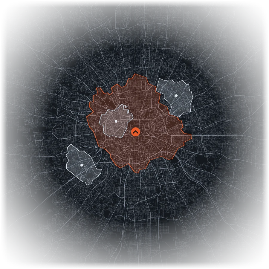 A dark map of a local market with glowing streets: the business marked with the Liftwork chevron inside its orange trade area, with competitor trade areas in grey nearby.